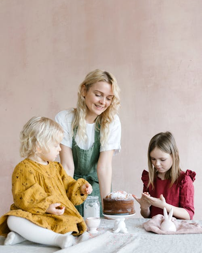 Mother baking with her children